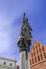 Monument to Peter Skarga on Mary Magdalene Square in Kharkiv against the blue sky - obrazy, fototapety, plakaty