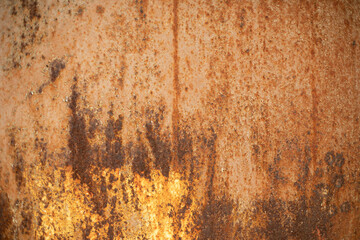Rusty metal. Texture of rust on wall. Brown shades. Spoiled steel.