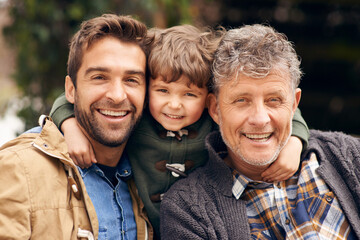 Three generations of the boys. Shot of a grandfather, his adult son and grandson enjoying a day outdoors. - obrazy, fototapety, plakaty