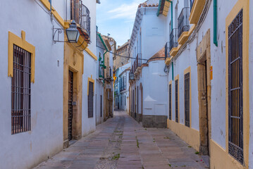 whitewashed street in the old town of the spanish city cordoba.
