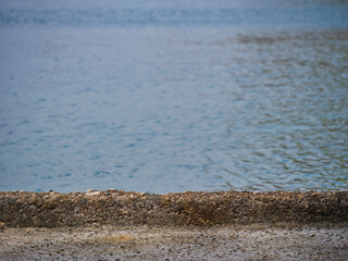 old stone pier and sea background