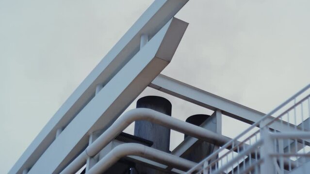 Ferry Smoke Stacks And Railings Under Overcast Sky