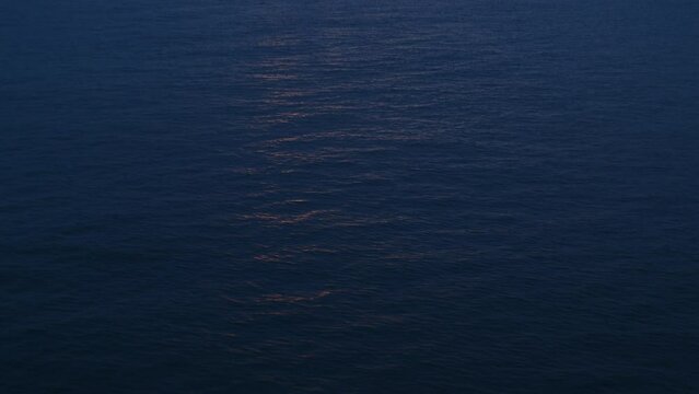 Surface Of Sea Sunlit By Sunset