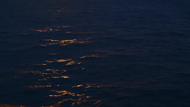 Surface Of Sea Sunlit By Sunset
