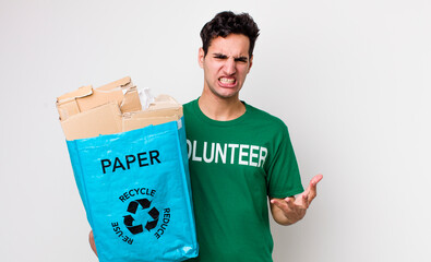handsome hispanic man looking angry, annoyed and frustrated. ecology concept