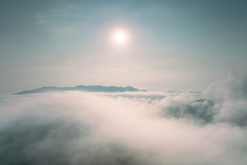 Fog in the morning forest with green mountains. Pang Puai, Mae Moh, Lampang, Thailand.