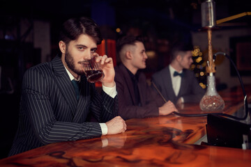 sitting in bar with friends