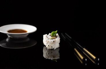 sushi with chopsticks