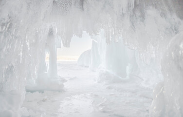 Beautiful transparent icicles in the ice cave on lake Baikal. View from the ice cave.