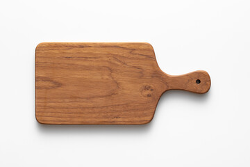 Handmade teak wood chopping board on white background. Handmade wooden chopping board.