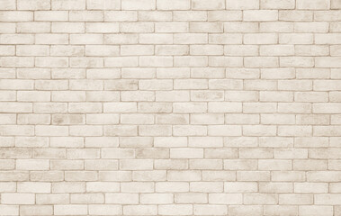 Empty background of wide cream brick wall texture. Beige old brown brick wall concrete or stone textured design backdrop.
