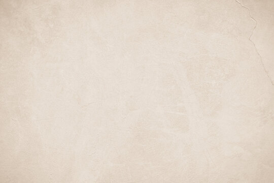 Old concrete wall texture background. Close up plain cream color cement wall texture.