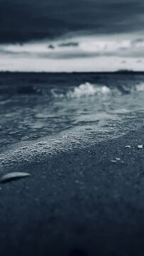 Vertical slow motion video of beach on gimbal