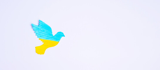 Support for Ukraine in the war with Russia, peace dove with flag of Ukraine. Pray, No war, stop war and stand with Ukraine concepts