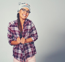 She has such a cute personality. Cropped shot of a young woman posing with a character beanie.