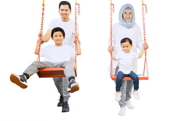 Muslim parents and children playing with swings
