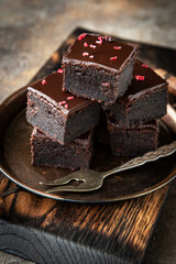 Chocolate brownie pieces, selective focus with shallow depth of field