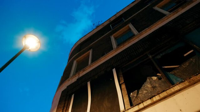 Establishing shot of a run down building in the city center