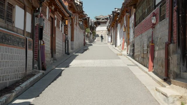 Panning shot of the famous traditional Korean street in Bukchon Hanok Village in Seoul, South Korea