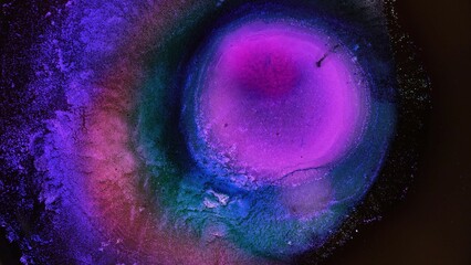 Neon purple pink dark blue colors abstract background. Alcohol ink art. Fantastic inkscape. Energy in the center of the circle. Helix Nebula. Eye of God. Stars in a spiral galaxy with gas cloud space
