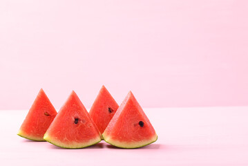 Sliced watermelon on pink color background, Tropical fruit in summer season