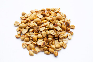 Roasted peanuts on white background.