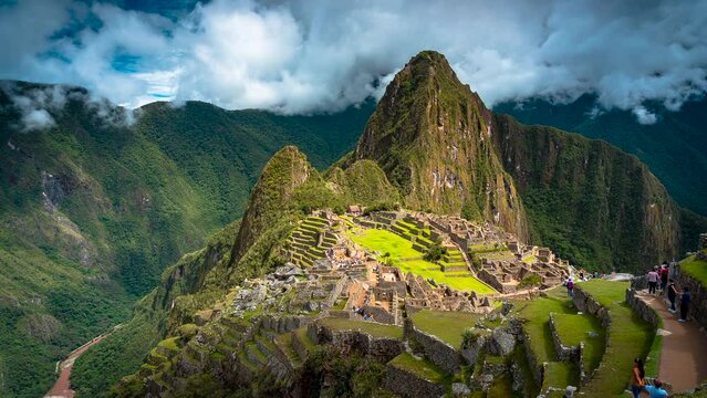 Machu Picchu Peru South America the lost city of Inca not far from Cusco city in the high mountains UNESCO World Heritage site timelapse ancient Inca ruins mysteries of the Inca Empire clouds