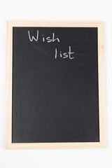 Mini blackboard with space for text on white background. Wish list concept