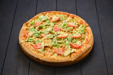 Pizza with squid, shrimps, parmesan and salad