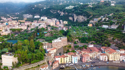 Aerial view of beautiful Sorrento Beach and port at summer sunset, Amalfi Coast - Italy
