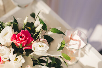 Flower arrangement of white eustoma and pink roses