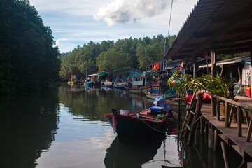 Fototapeta premium Salakkok Fishing Village, is located along a peaceful, sheltered stretch of coast, at the southern edge of Salak Khok bay, in Koh Chang Island, Trat Province, Thailand