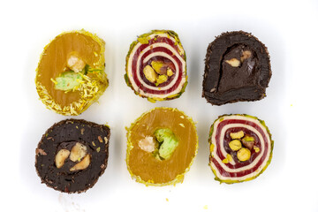 Assortment of Turkish delight with pistachio isolated on a white background. close up