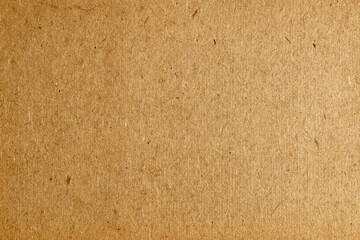 Brown cardboard background, flawed paper texture