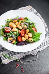 salad bean tomato, onion, lettuce leaves mix fresh healthy meal diet snack on the table copy space food background keto or paleo diet veggie vegan or vegetarian food