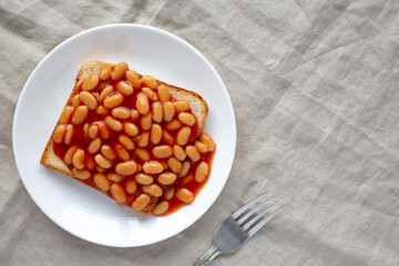 Delicious English Beans on Toast, top view. Flat lay, overhead, from above. Copy space.