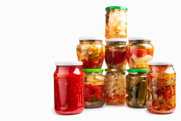 Fototapeta na wymiar Homemade canned various vegetables and spices in glass jars