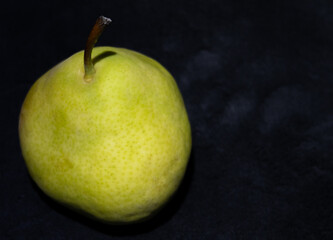 Pear isolated on black background