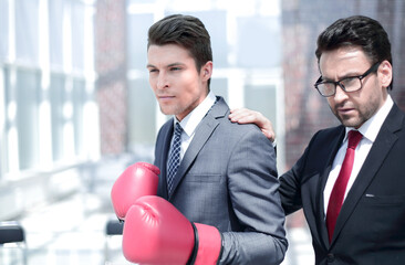 confident young businessman preparing to defend