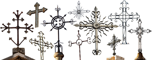Collection of Religious Crosses in wrought iron isolated on white background, Italy, Europe.