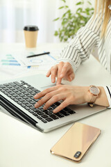 Young business woman working at her workplace