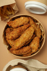 Concept of tasty food with Chicken strips, top view