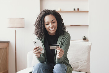 Woman holding credit card and using smartphone at home, businesswoman shopping online, e-commerce, internet banking, spending money, working from home concept