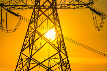 High voltage post,High voltage tower sky sunset background.