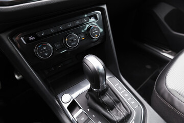Obraz na płótnie Canvas Gear lever and climate control panel of modern luxury crossover car