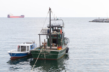 Fishing boats are anchored in Avcilar port, district of Istanbul