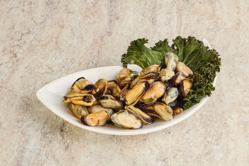 Tasty marinated mussels in the bowl