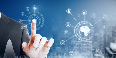 Close up of male hand pointing at abstract glowing business data and earth hologram on blurry blue city background. Communication and media concept. Double exposure.