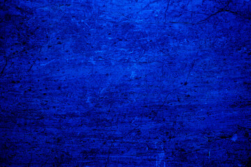 Abstract. Dark blue old concrete wall. The texture has an attractive unique pattern that is perfect for a Design background image.