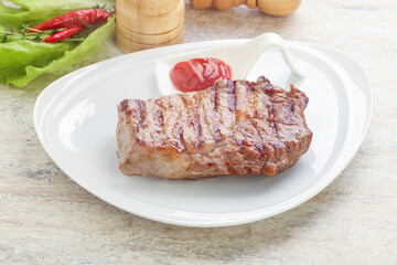 Grilled rib-eye steak beef meat